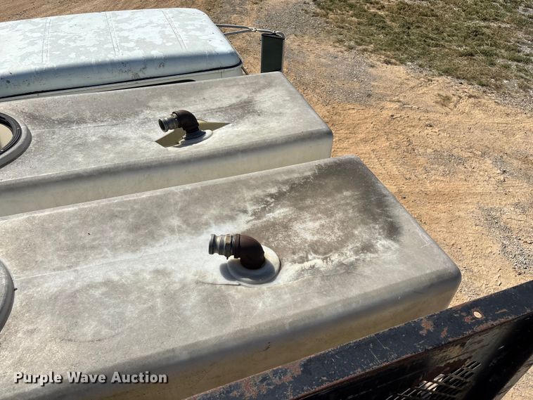 image for item ED2199 1995 International 4700 flatbed truck