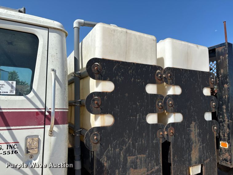 image for item ED2199 1995 International 4700 flatbed truck