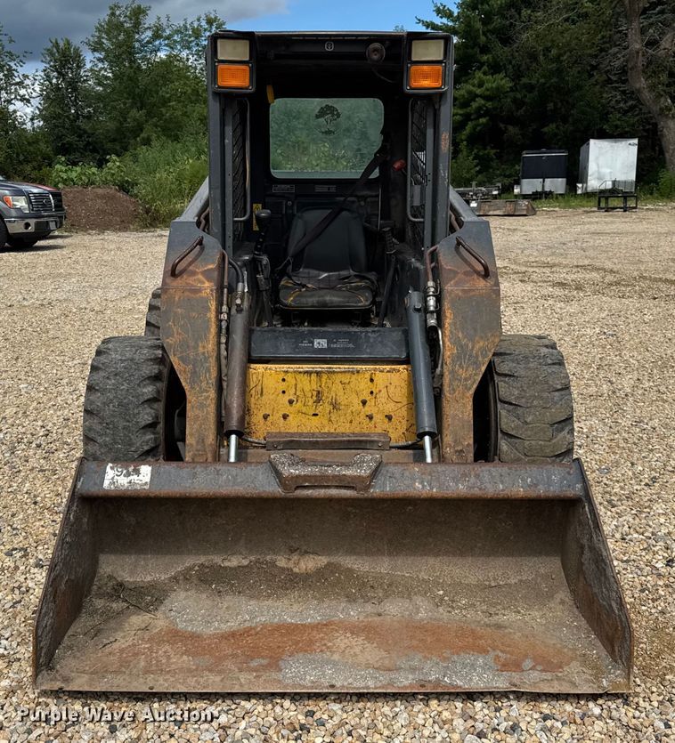 MINI CARGADOR SOBRE RUEDAS 2003 NEW HOLLAND LS180