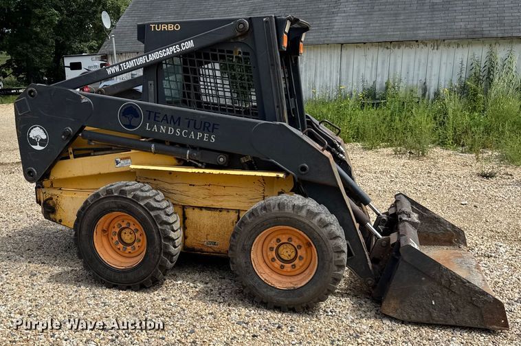 MINI CARGADOR SOBRE RUEDAS 2003 NEW HOLLAND LS180