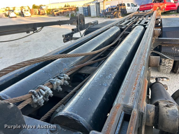 image for item ET3102 2000 Mack RD688S  roll-off container truck