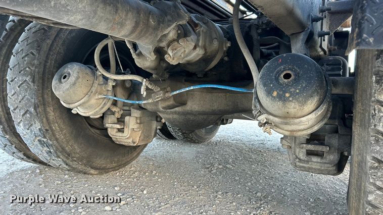 image for item ET3102 2000 Mack RD688S  roll-off container truck