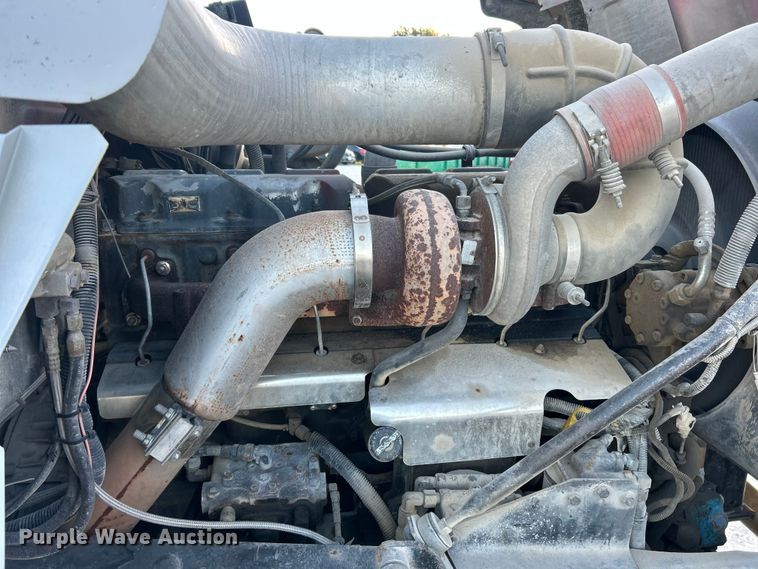 image for item ET3102 2000 Mack RD688S  roll-off container truck