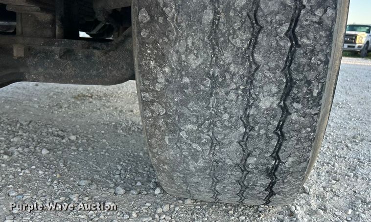 image for item ET3102 2000 Mack RD688S  roll-off container truck