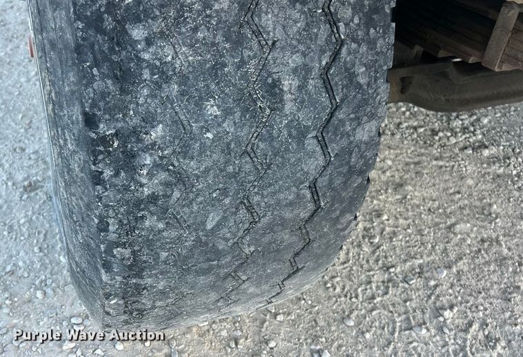 image for item ET3102 2000 Mack RD688S  roll-off container truck