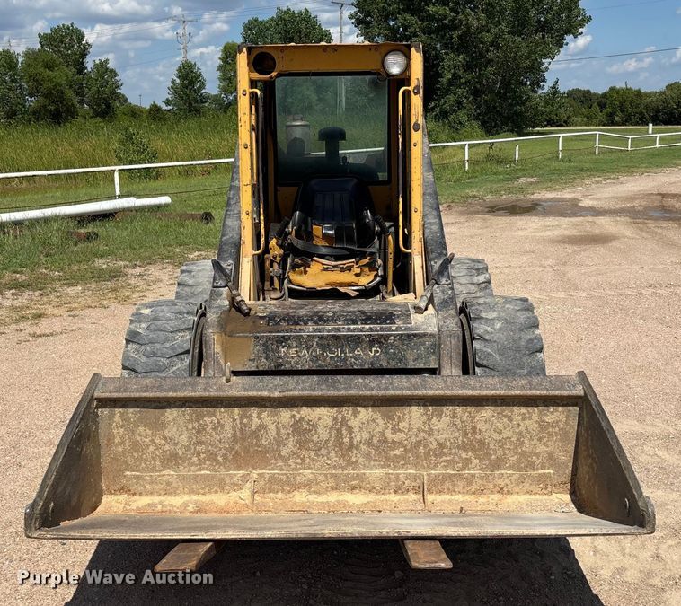 MINI CARGADOR SOBRE RUEDAS 1989 NEW HOLLAND L785