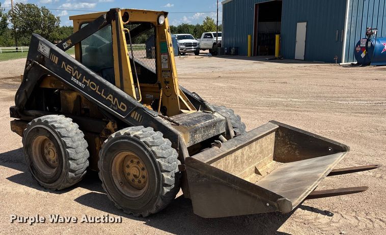 MINI CARGADOR SOBRE RUEDAS 1989 NEW HOLLAND L785