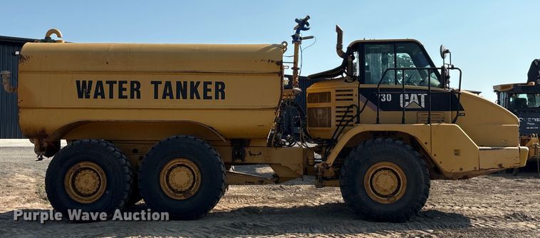 image for item EU0068 2006 Caterpillar 730 water wagon