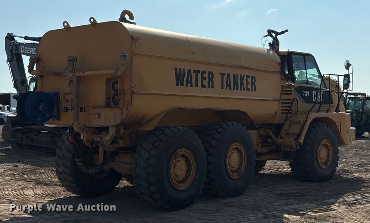 image for item EU0068 2006 Caterpillar 730 water wagon