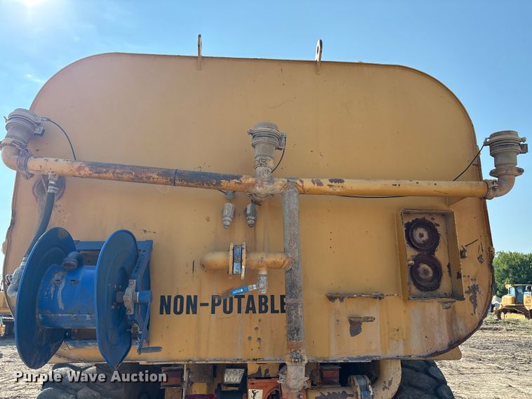 image for item EU0068 2006 Caterpillar 730 water wagon