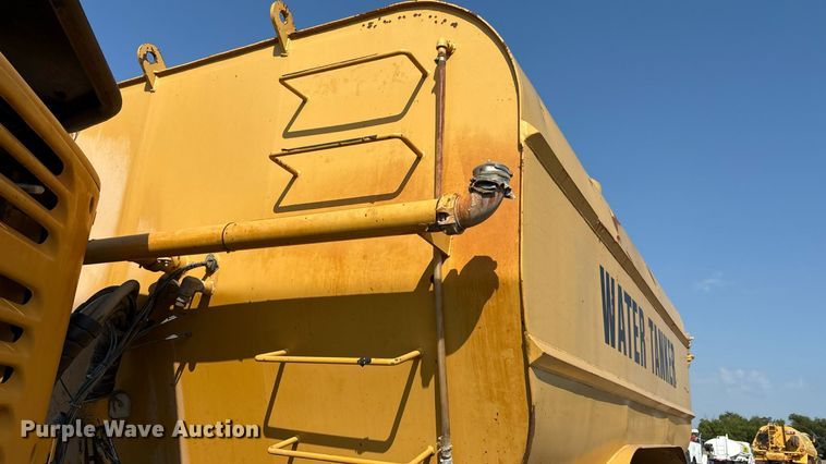 image for item EU0068 2006 Caterpillar 730 water wagon