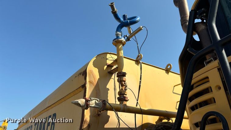 image for item EU0068 2006 Caterpillar 730 water wagon