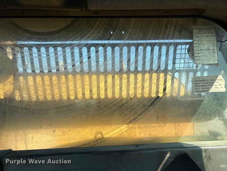 image for item EU0068 2006 Caterpillar 730 water wagon