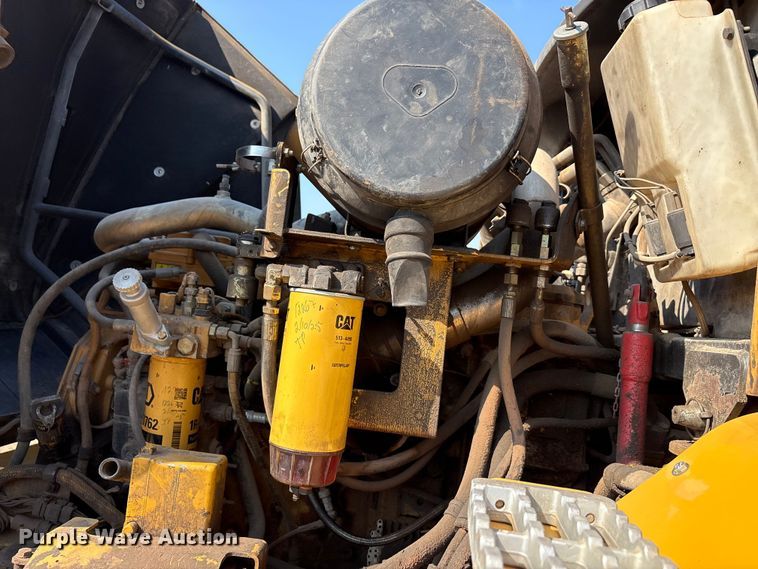 image for item EU0068 2006 Caterpillar 730 water wagon