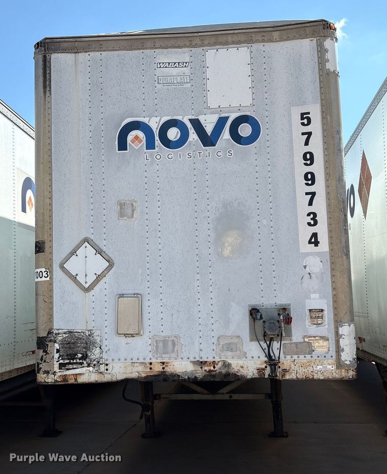 image for item EM0609 1999 Wabash DVCVHPC dry van trailer
