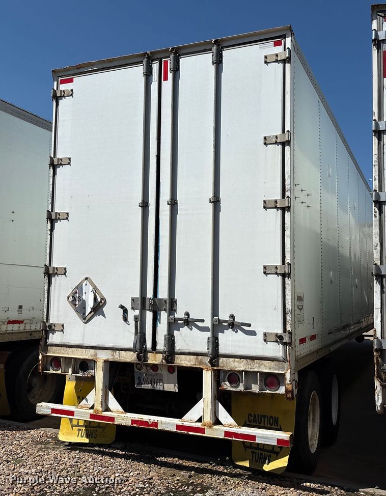 image for item EM0609 1999 Wabash DVCVHPC dry van trailer