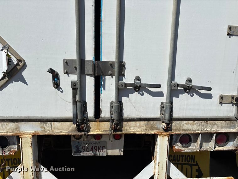 image for item EM0609 1999 Wabash DVCVHPC dry van trailer