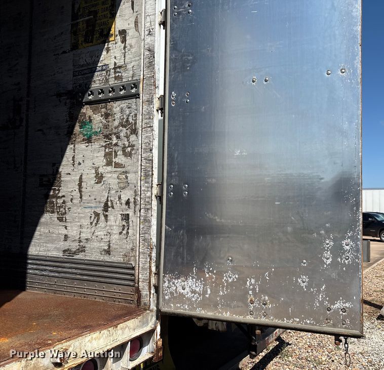 image for item EM0609 1999 Wabash DVCVHPC dry van trailer