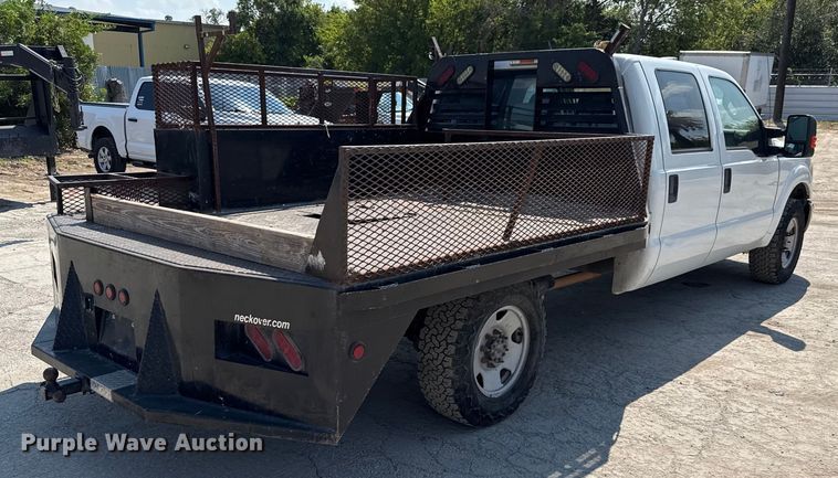 image for item DX5790 2014 Ford F250 Super Duty Crew Cab flatbed pickup truck