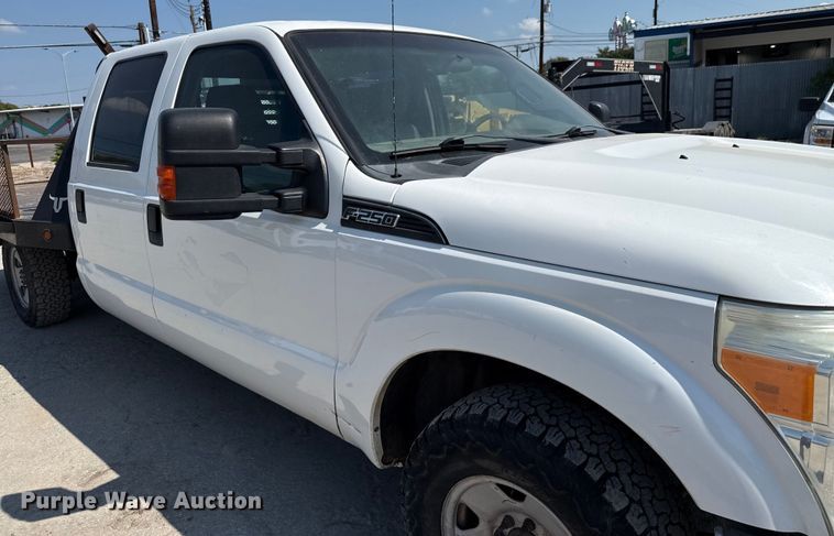 image for item DX5790 2014 Ford F250 Super Duty Crew Cab flatbed pickup truck