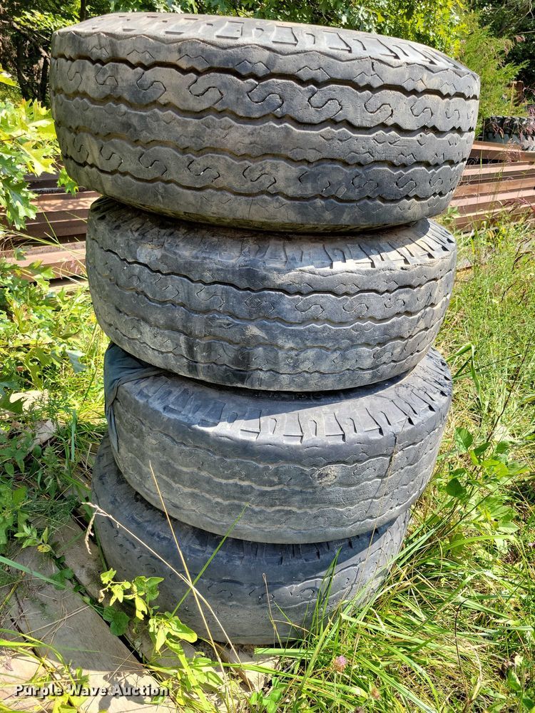 image for item DZ6568 (4) Deestone 12-16.5LT tires and wheels