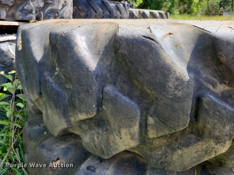 image for item DZ6572 (4) 14-24 tires and wheels