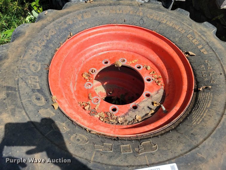 image for item DZ6572 (4) 14-24 tires and wheels