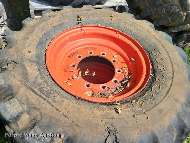 image for item DZ6572 (4) 14-24 tires and wheels