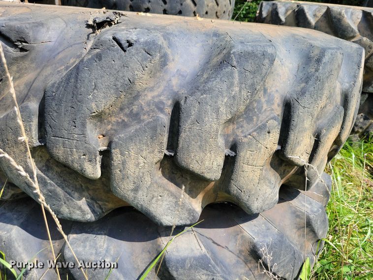 image for item DZ6572 (4) 14-24 tires and wheels