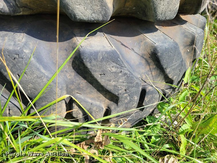 image for item DZ6572 (4) 14-24 tires and wheels