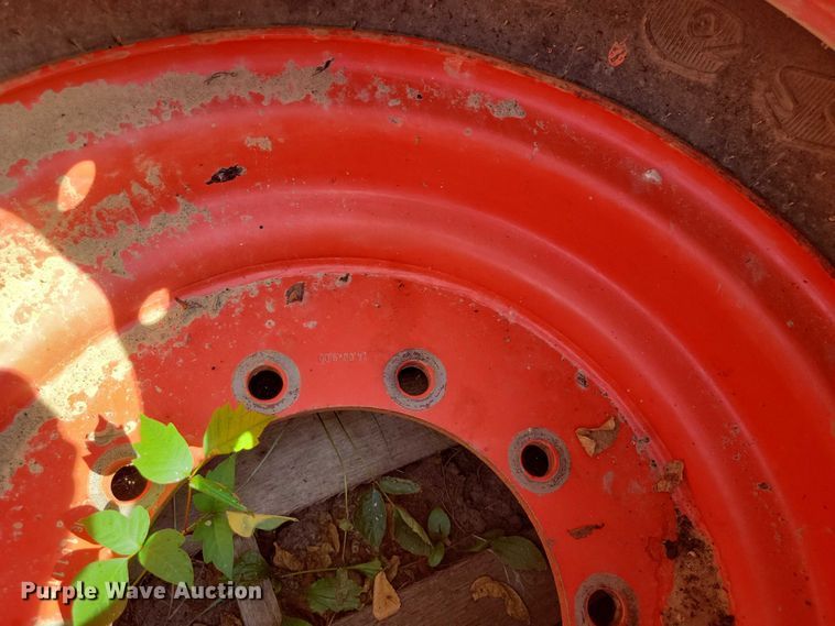 image for item DZ6572 (4) 14-24 tires and wheels