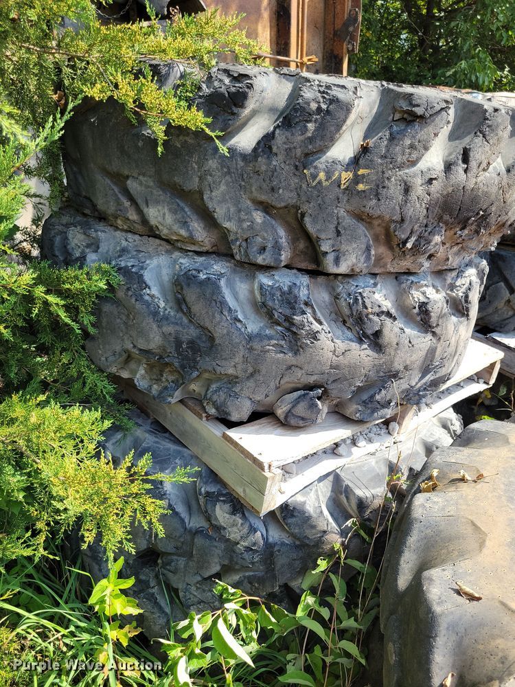 image for item DZ6573 (4) 14-24 tires and wheels