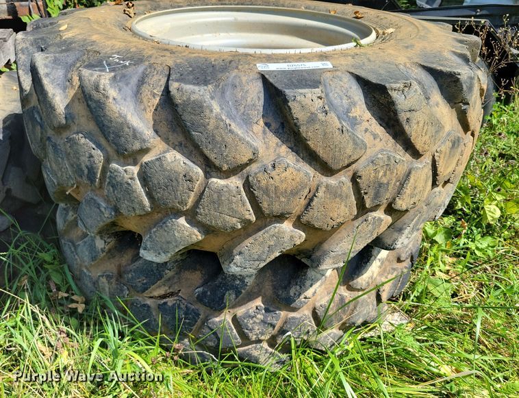 image for item DZ6573 (4) 14-24 tires and wheels