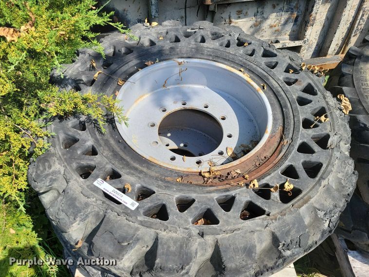 image for item DZ6573 (4) 14-24 tires and wheels