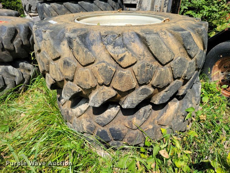 image for item DZ6573 (4) 14-24 tires and wheels