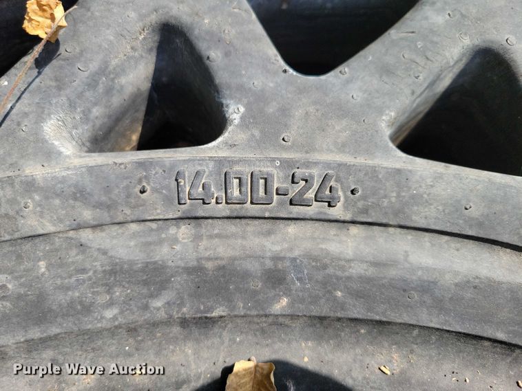 image for item DZ6573 (4) 14-24 tires and wheels