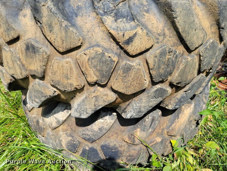 image for item DZ6573 (4) 14-24 tires and wheels