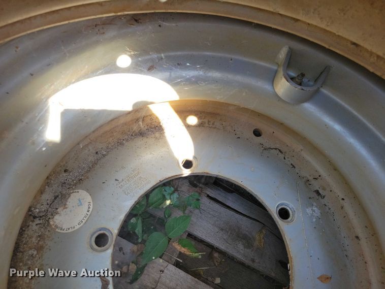 image for item DZ6573 (4) 14-24 tires and wheels