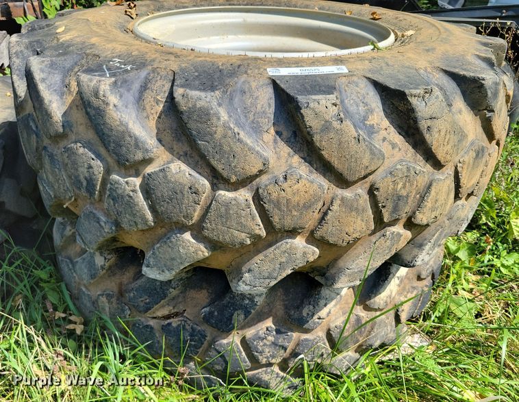 image for item DZ6575 (2) 17.5-25 tires and wheels 