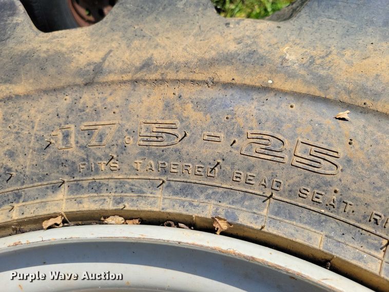 image for item DZ6575 (2) 17.5-25 tires and wheels 