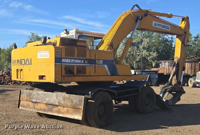 image for item EC1164 1997 Hyundai Robex 200W-2 wheeled excavator