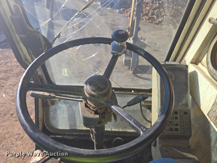 image for item EC1164 1997 Hyundai Robex 200W-2 wheeled excavator