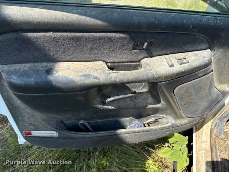 image for item EP0518 2001 Chevrolet Silverado 3500 Ext. Cab flatbed pickup truck