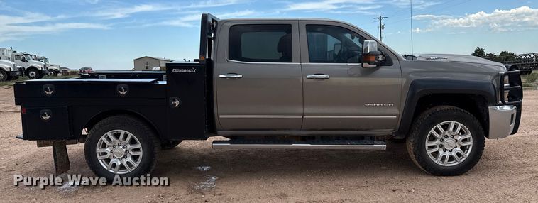image for item EP0537 2017 Chevrolet Silverado 2500HD Crew Cab flatbed pickup truck