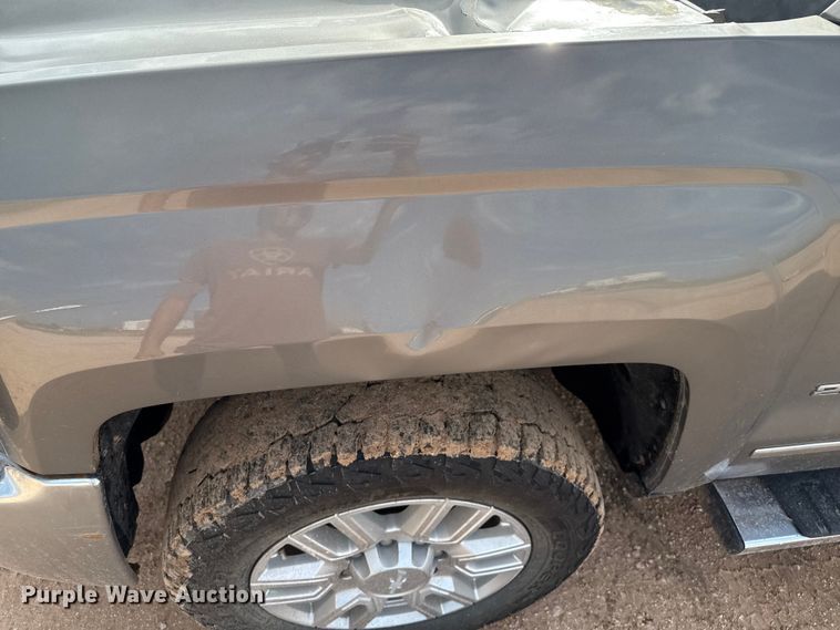 image for item EP0537 2017 Chevrolet Silverado 2500HD Crew Cab flatbed pickup truck