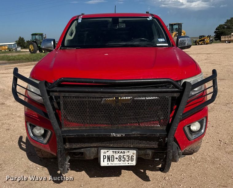image for item EP0571 2015 Chevrolet Colorado Ext. Cab flatbed pickup truck