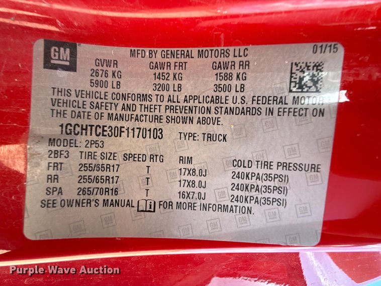 image for item EP0571 2015 Chevrolet Colorado Ext. Cab flatbed pickup truck