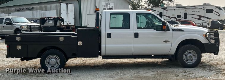 image for item ET3129 2016 Ford F350 Super Duty XL Crew Cab flatbed pickup truck