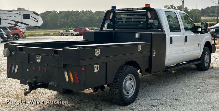 image for item ET3129 2016 Ford F350 Super Duty XL Crew Cab flatbed pickup truck