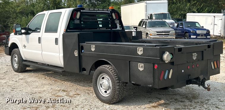 image for item ET3129 2016 Ford F350 Super Duty XL Crew Cab flatbed pickup truck